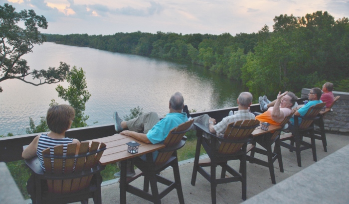 on the terrace at Deer Creek Lodge overlooking the lake